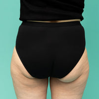 Very slightly absorbent incontinence briefs for women